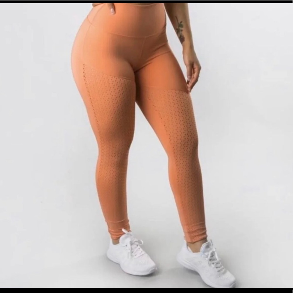 BuffBunny Posh Leggings in coral/peach color